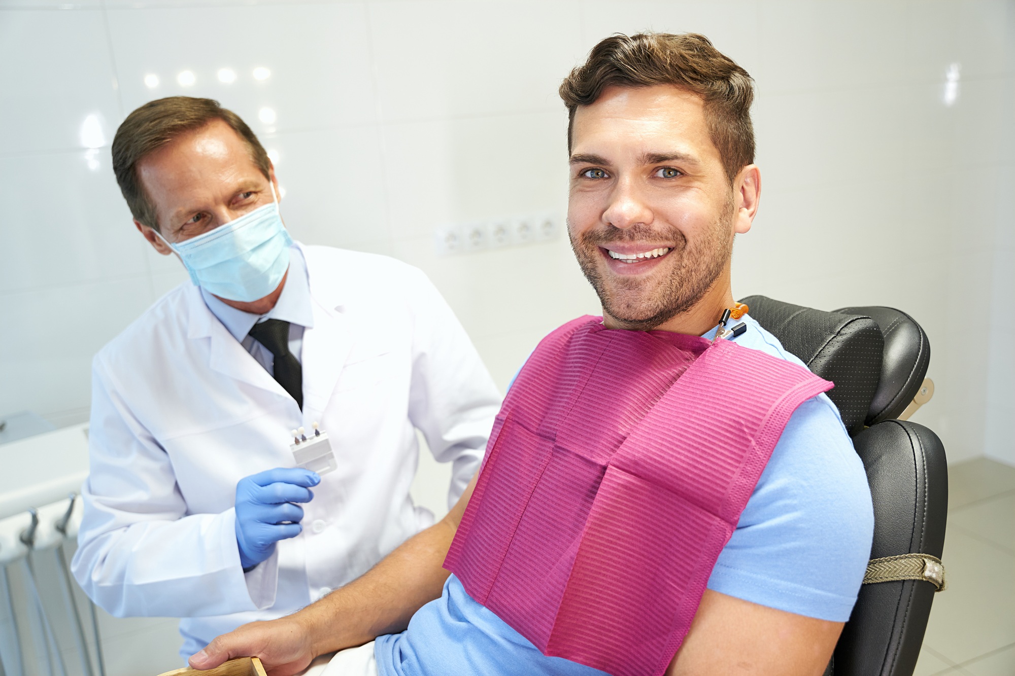 Happy patinet of dental clinic during a dentist appointment