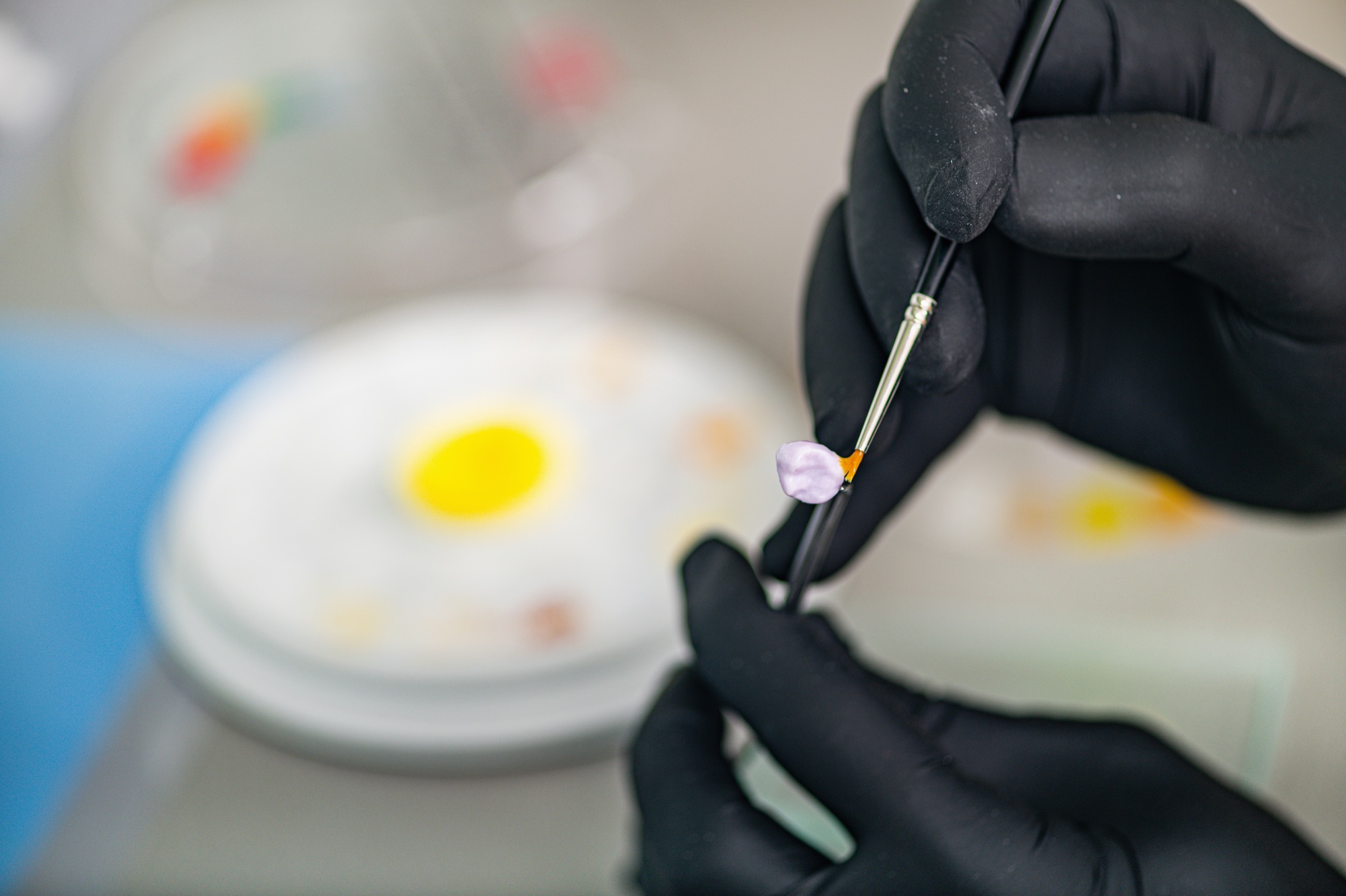 Prosthodontics. Dental Technician Making a Crown.