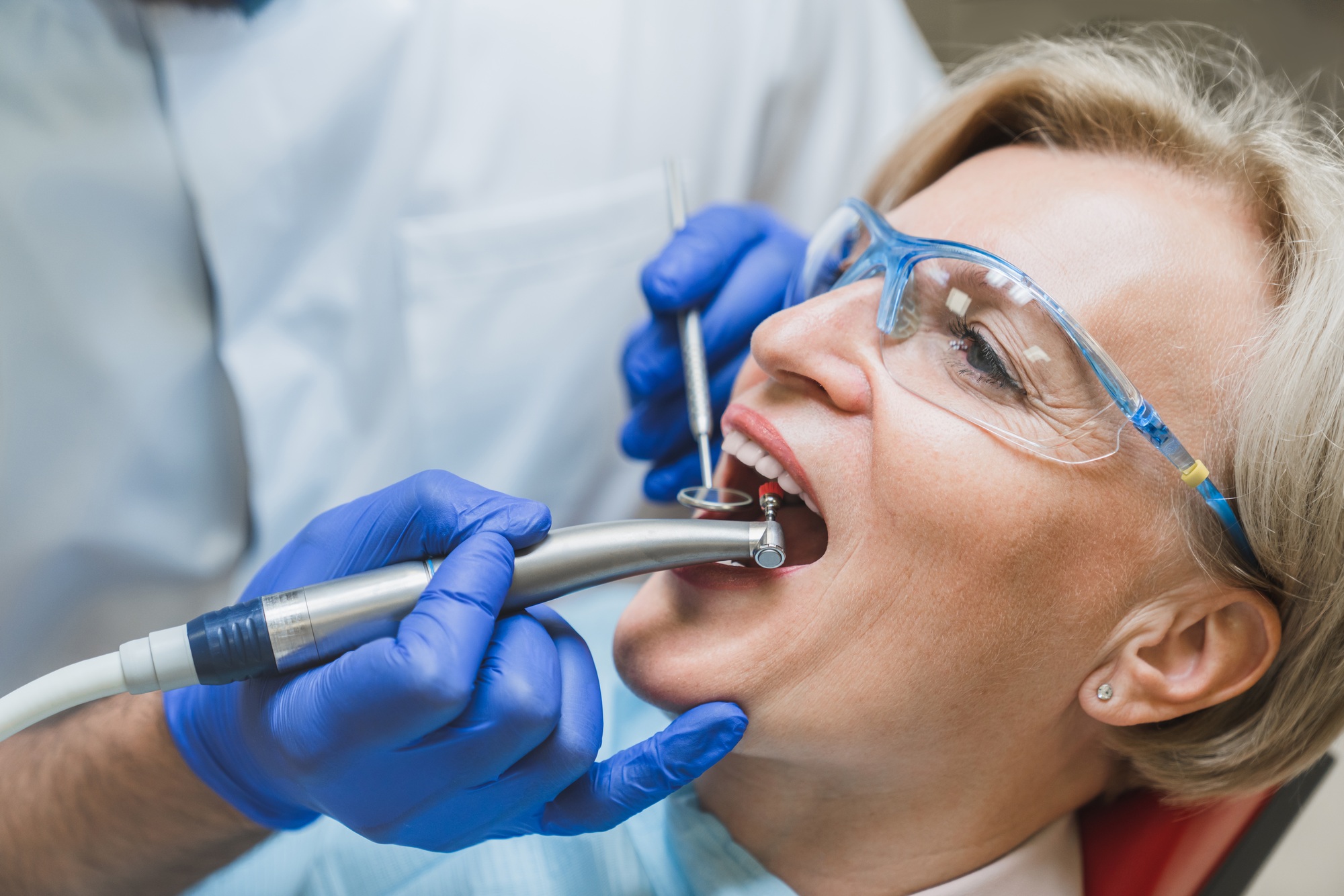 Stomatological dental equipment, dentist whitening filling tooth of patient at dental hospital