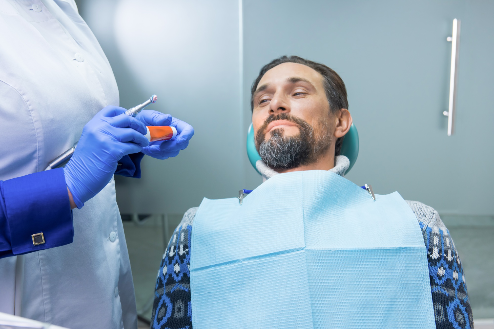 Dentist with patient