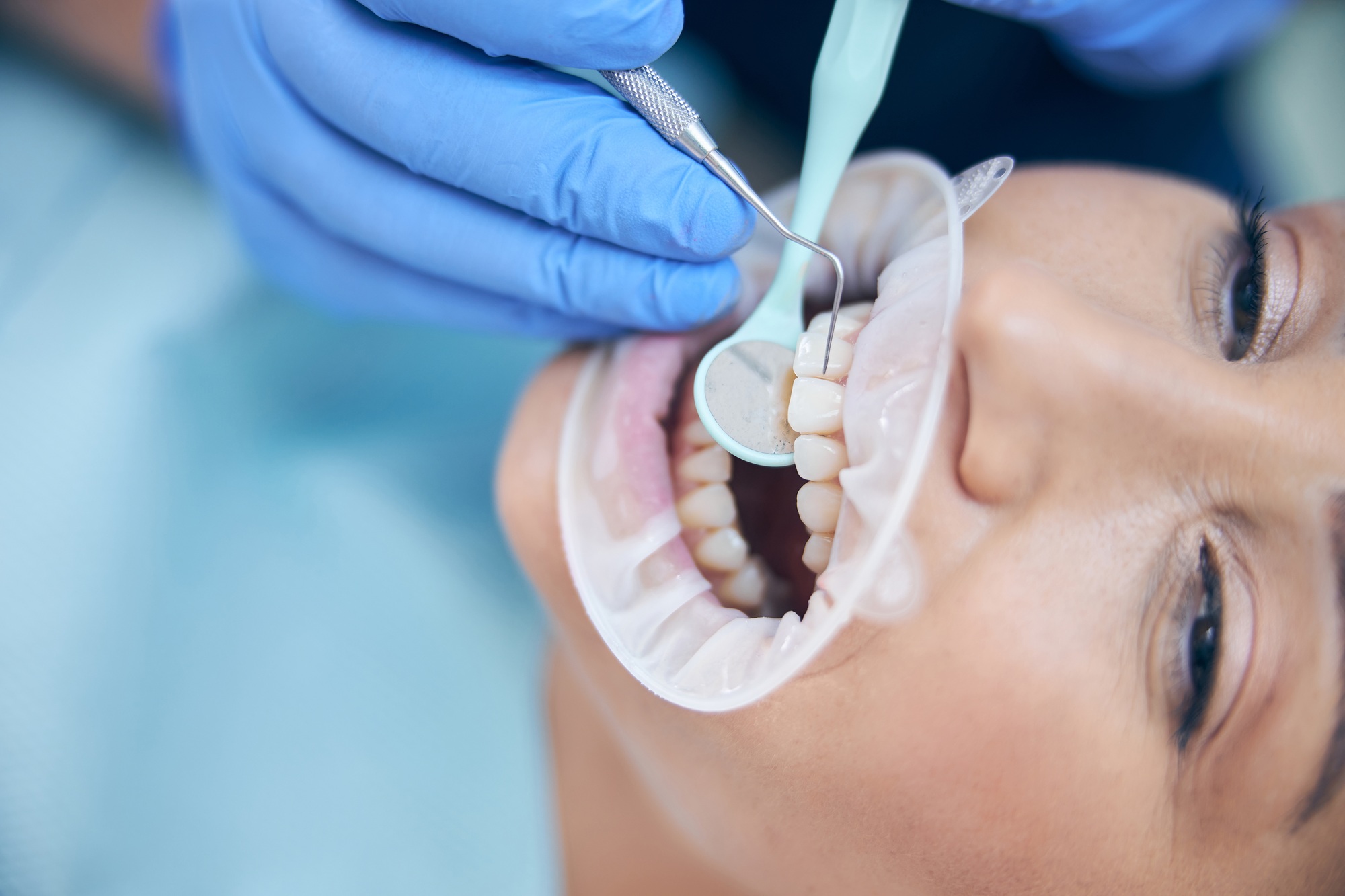 Young woman having filling put in clinic