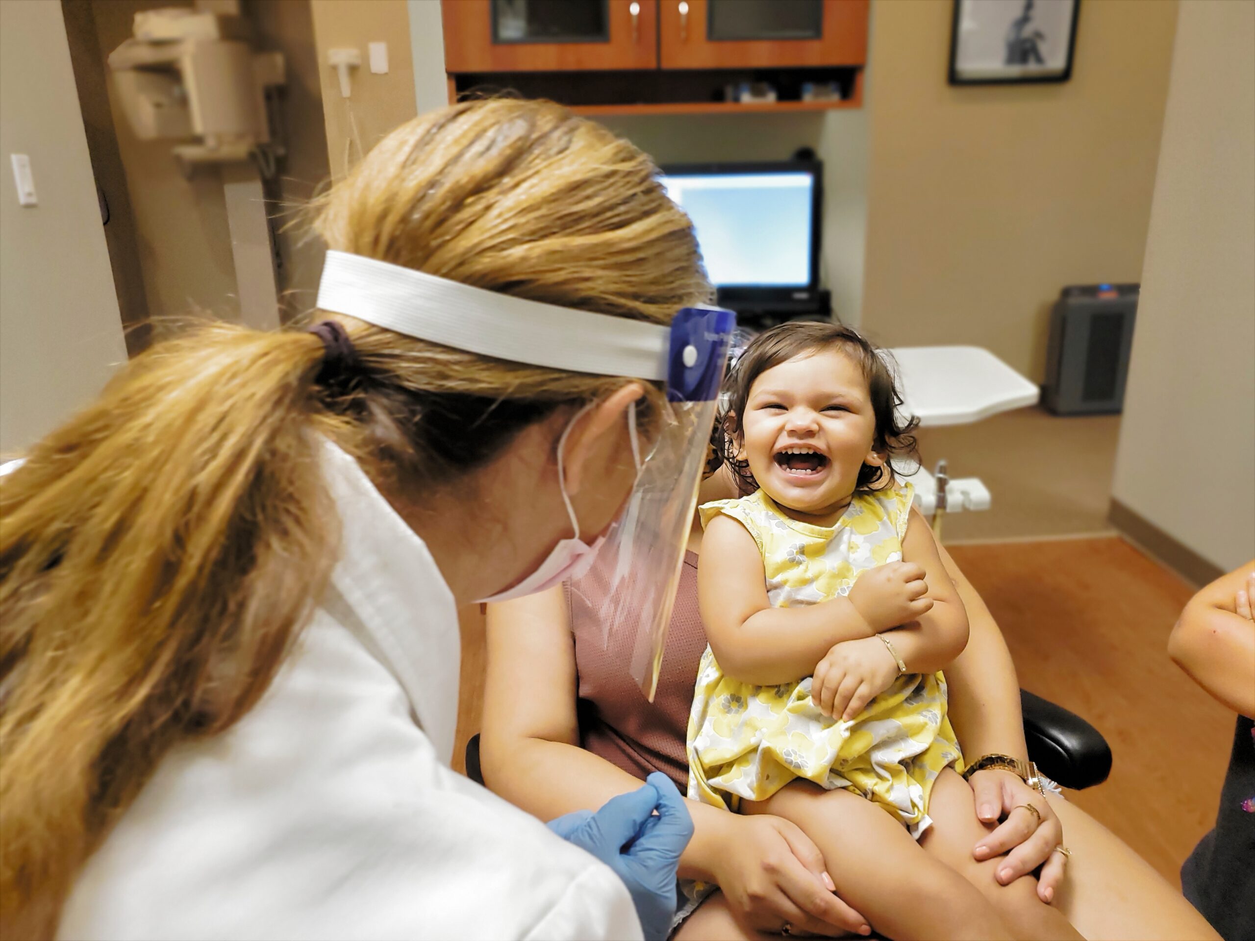 Dental team examines the oral health and provides advice on oral care for children.