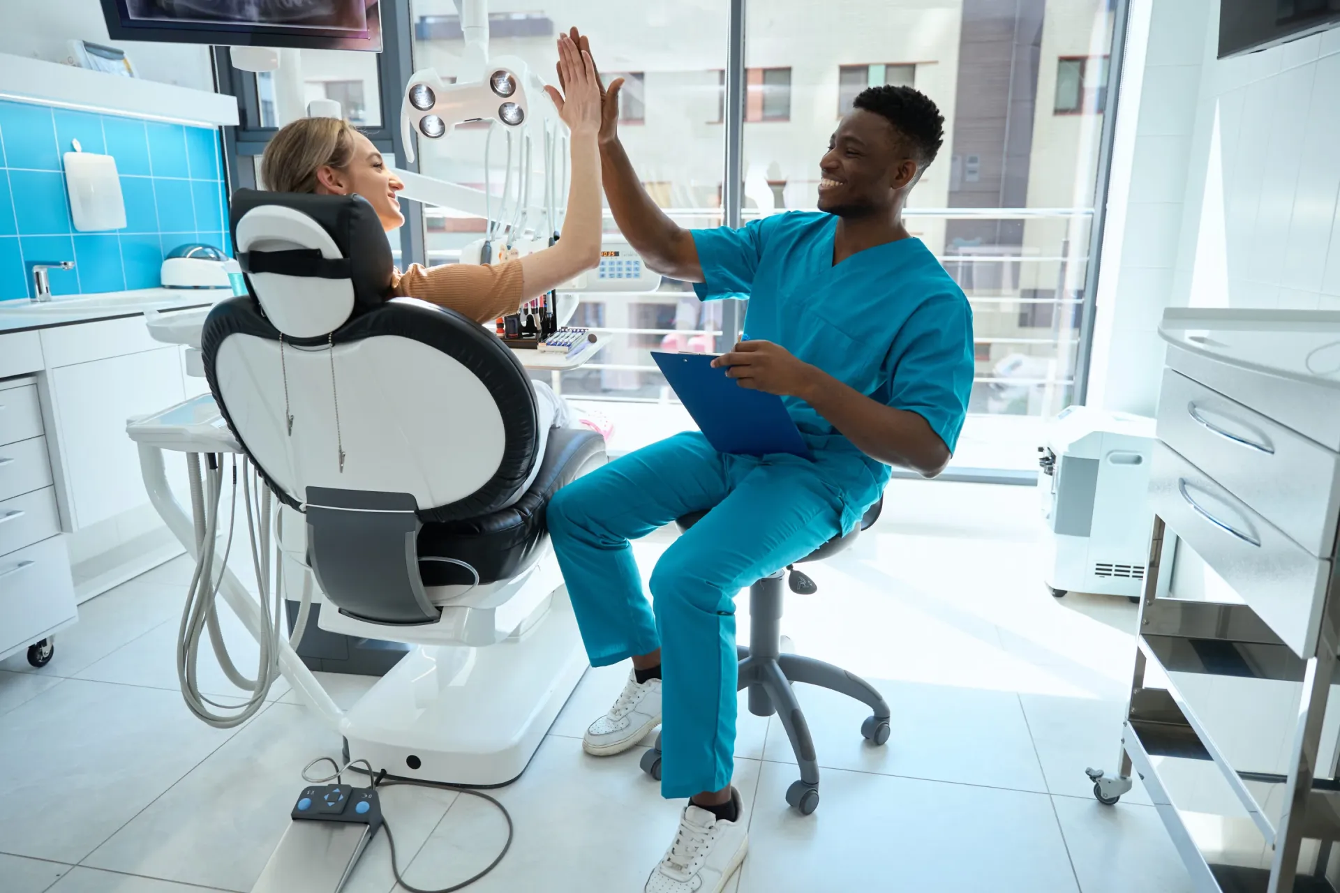 Patient discussing care with a dental team member